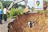 Khabar East:Relying-on-Google-Maps-while-riding-a-bike-proved-costly-a-young-man-fell-into-a-pothole-along-with-his-bike