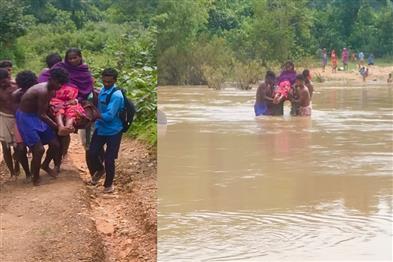 Khabar East:Villagers-carried-a-pregnant-woman-writhing-in-labor-pain-across-the-river-to-the-hospital
